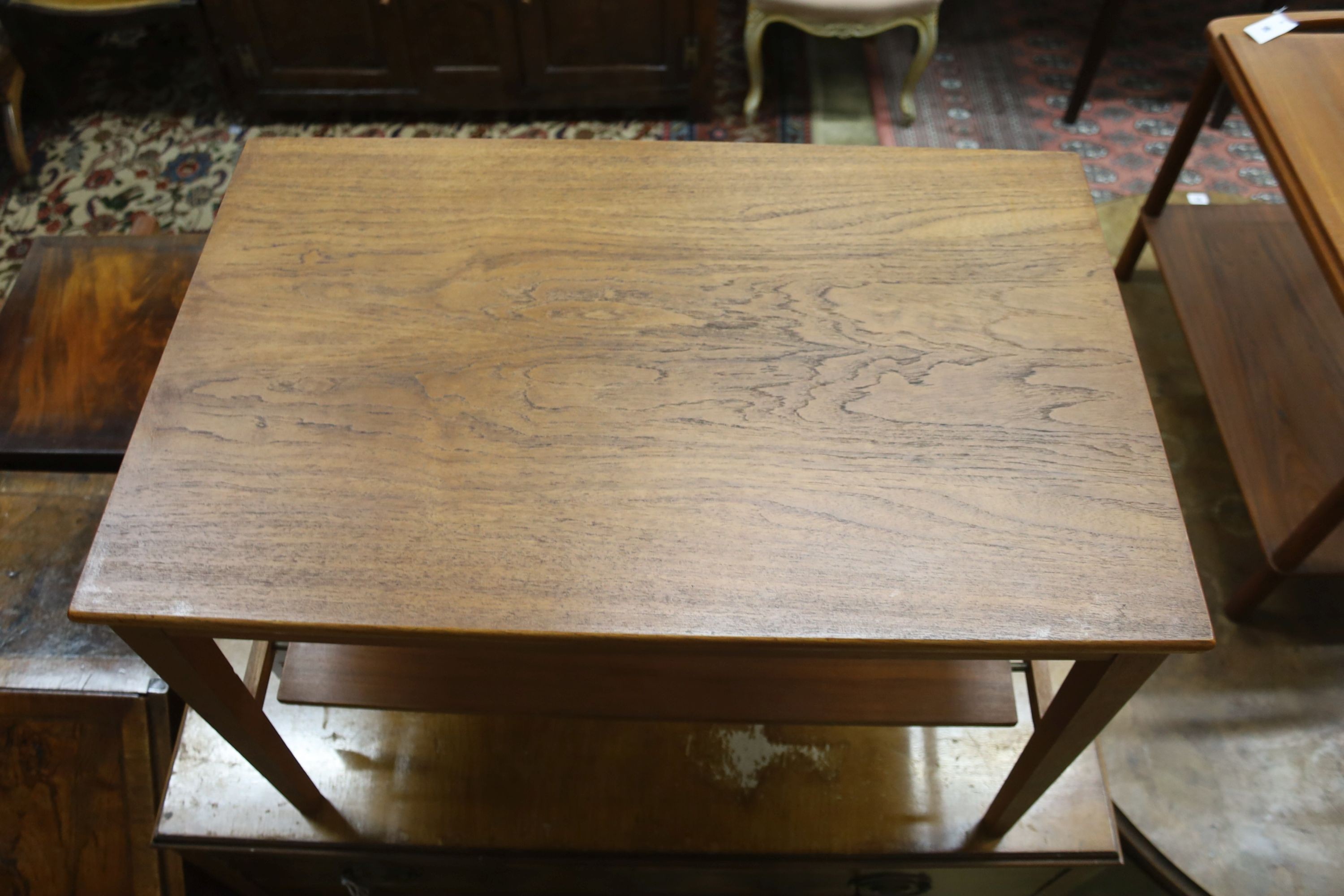 A mid century design Danish style teak two-tier occasional table, width 68cm, depth 43cm, height 45cm